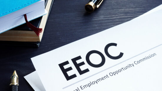 Equal Employment Opportunity Commission EEOC document and pen on a table.